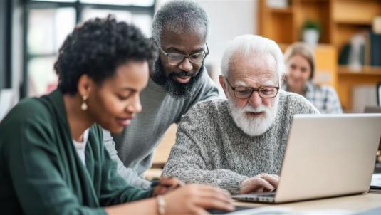 Pensioners attending a digital support session