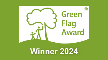 Green background with white Green Flag Award Winner 2024 logo