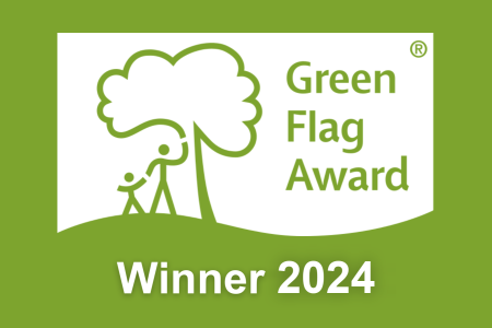 Green background with white Green Flag Award Winner 2024 logo